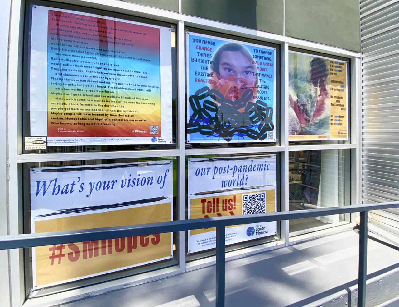 Photograph of Paula Goldman's Archive of Hopes and Dreams installed on banners in Downtown Santa Monica